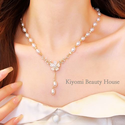 Delicate Pearl Necklace with Floral Design