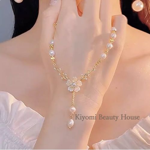 Delicate Pearl Necklace with Floral Design